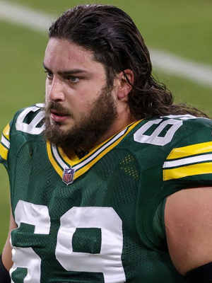 A picture of David Bakhtiari in a green Packers uniform